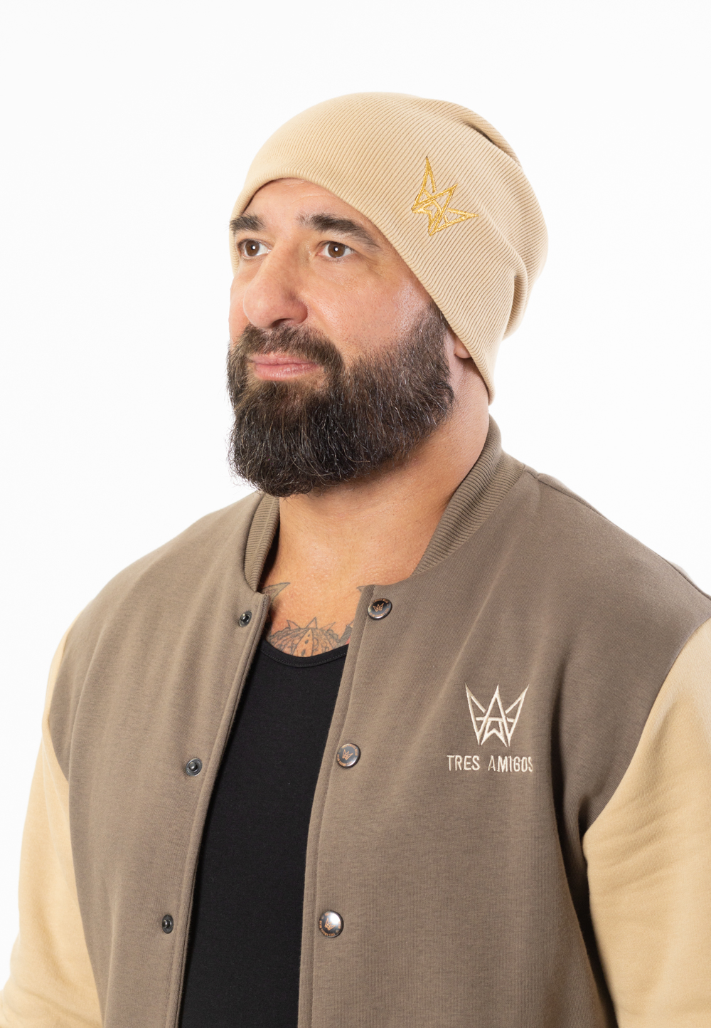 Bawełniana czapka zimowa w kolorze beżowym ze złotą haftowaną koroną