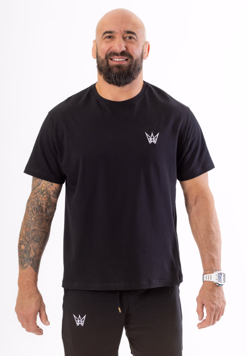 Koszulka Oversize z krótkim rękawem w kolorze czarnym z białą haftowaną koroną.