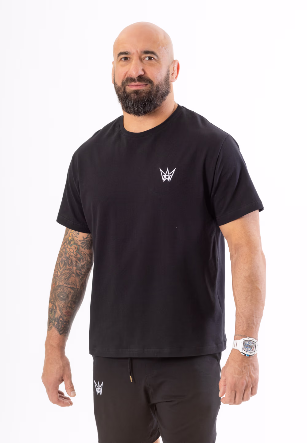 Koszulka Oversize z krótkim rękawem w kolorze czarnym z białą haftowaną koroną.