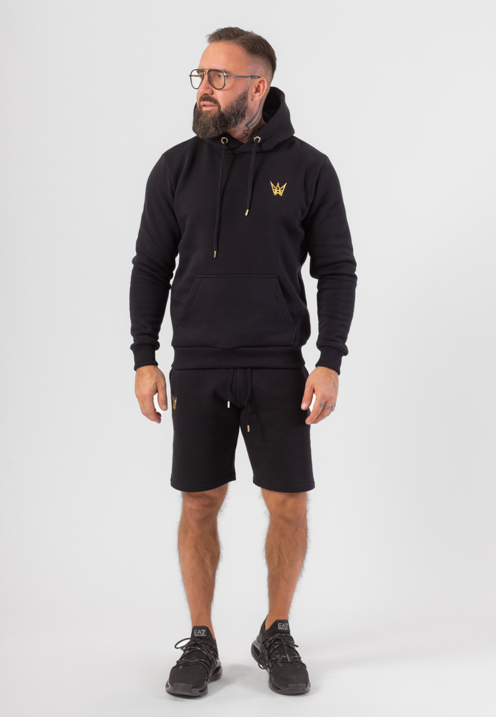 Krótkie spodenki bawełniane w kolorze czarnym ze złotą haftowaną koroną