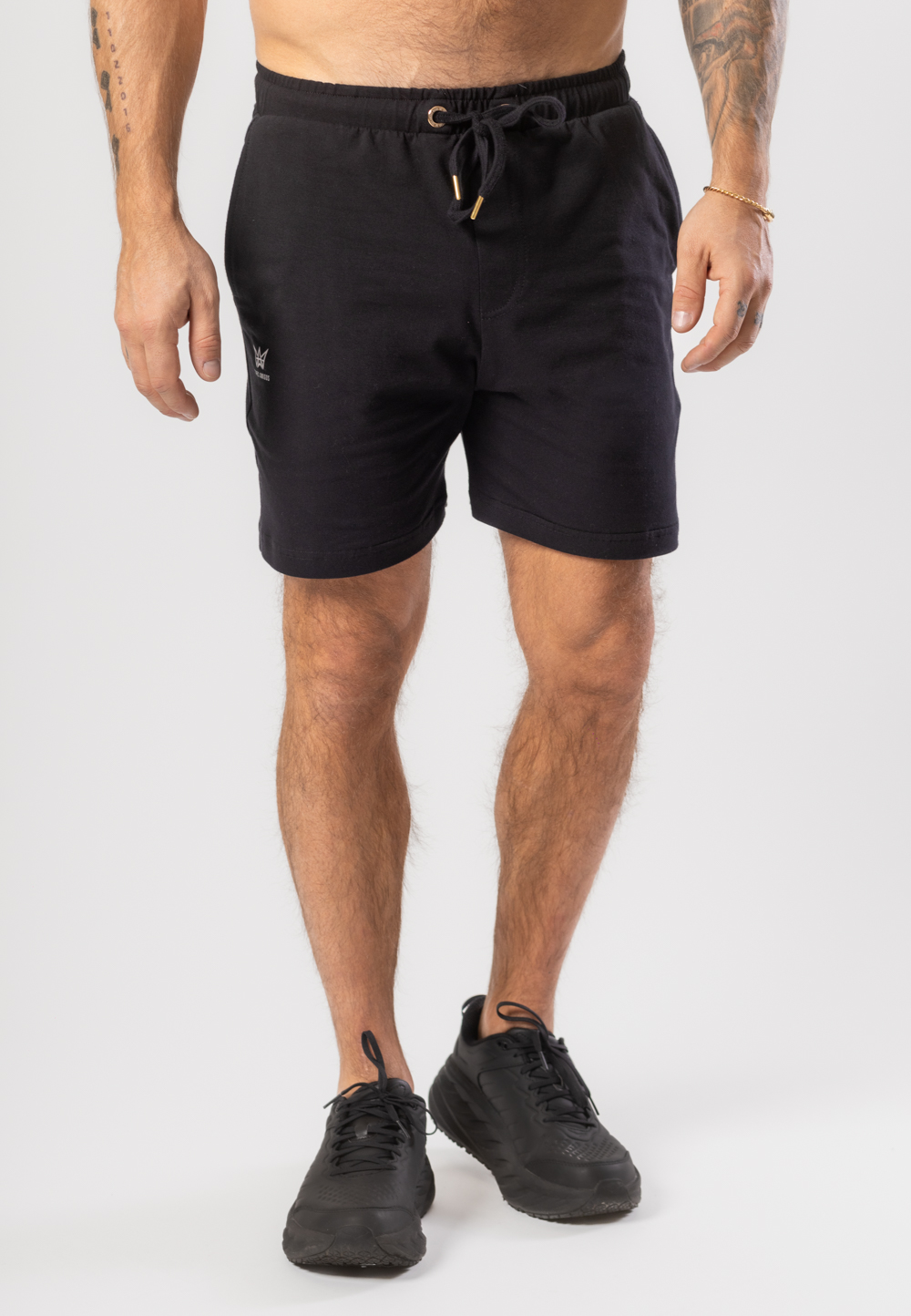 Krótkie spodenki Oversize w kolorze czarnym z białą drukowaną koroną.