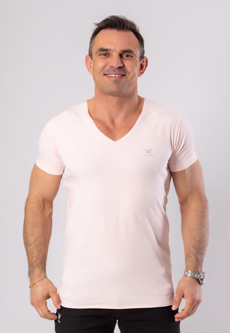 Koszulka Deepneck z krótkim rękawem w kolorze różowym z szarą drukowaną koroną.