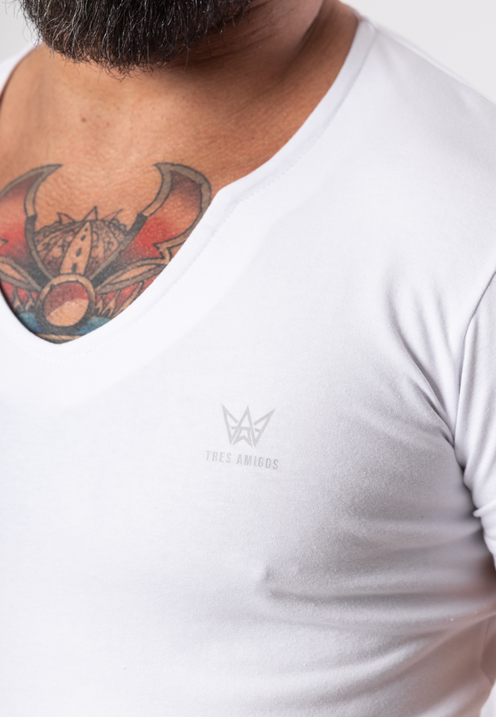 Koszulka z krótkim rękawem w kolorze białym z szarą drukowaną koroną.