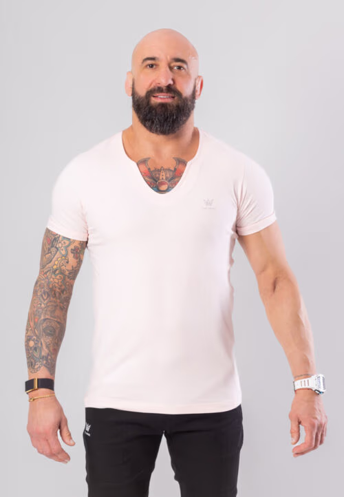 Koszulka z krótkim rękawem w kolorze różowym z szarą drukowaną koroną.